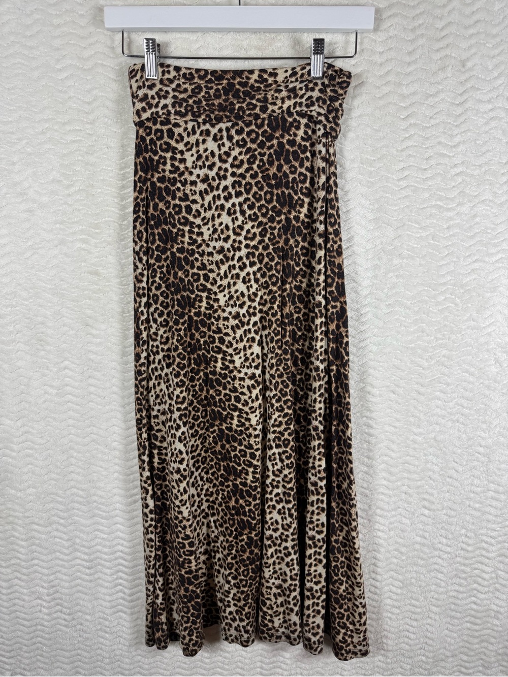 Up leopard print maxi skirt featuring a high waist panel and a flowy silhouette